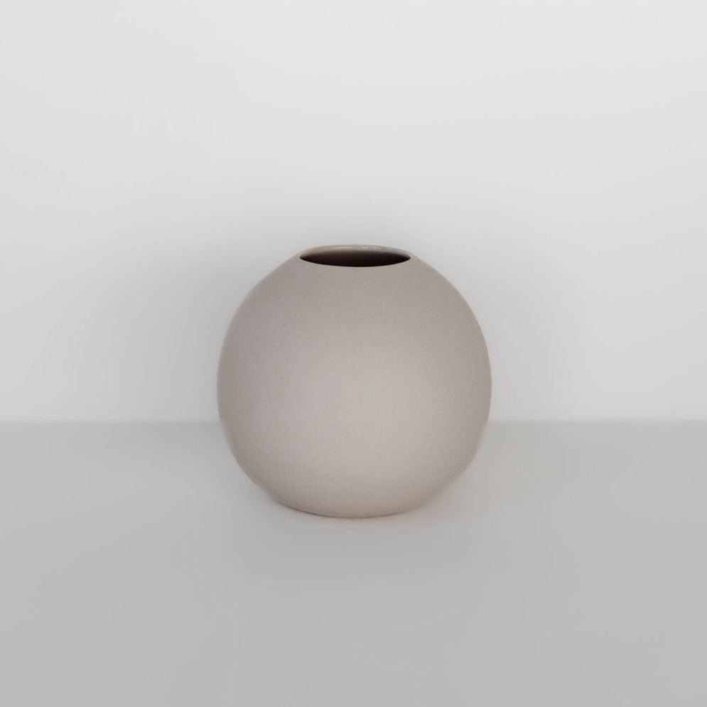 A simple cloud bubble vase in chalk color from Marmoset Found, hand-cast in ceramic with a spherical shape and a small opening, displayed against a plain white background.
