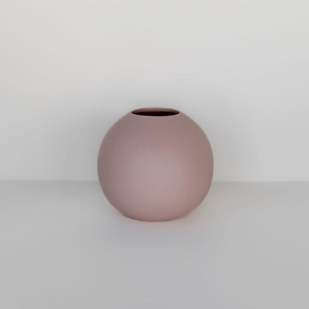 A simple round-shaped icy pink Marmoset Found cloud bubble vase with a narrow opening, centered on a white background.