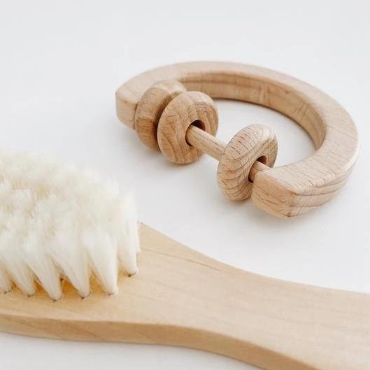 Our Natural Beech Wood pieces are 100% certified non-toxic and hand sanded to a smooth finish. Each rattle is left unpolished, uncoated and untreated great for skin sensitivities and possible allergies.
