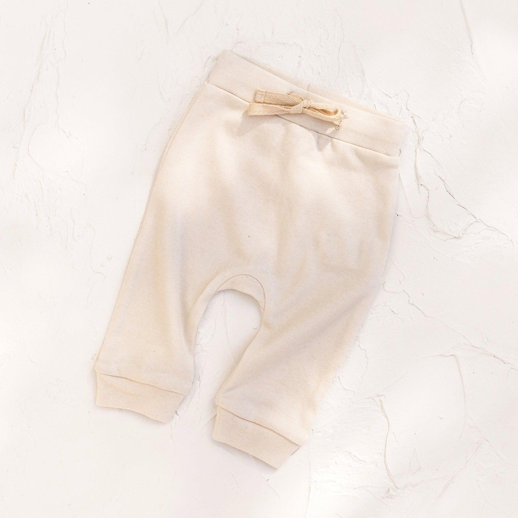 100% GOTS certified Organic Cotton. Pant with natural rope drawstring waist.