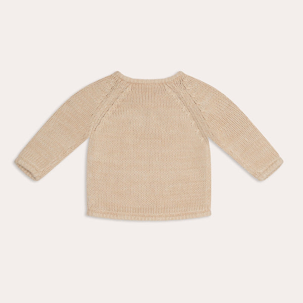 The back view of an Illoura the Label illoura knit poet jumper in sand.