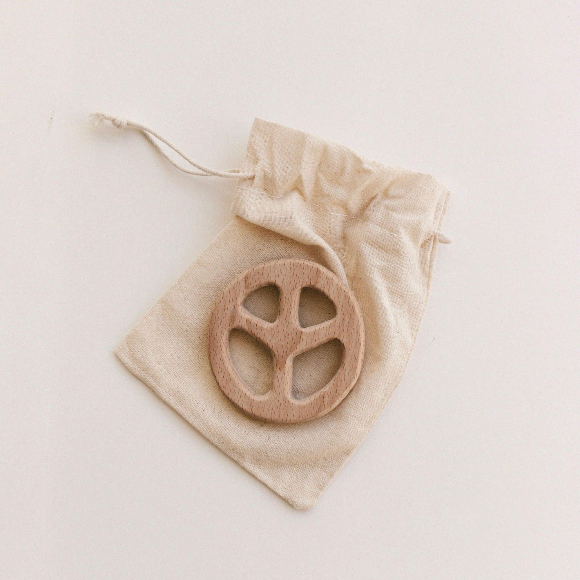 A simple and beautiful eco friendly natural wood teether. Specially designed for relieving delicate sore gums when teething. An added bonus when purchasing wooden pieces for your little ones is that they become a wonderful keepsake item for you to keep and cherish forever.