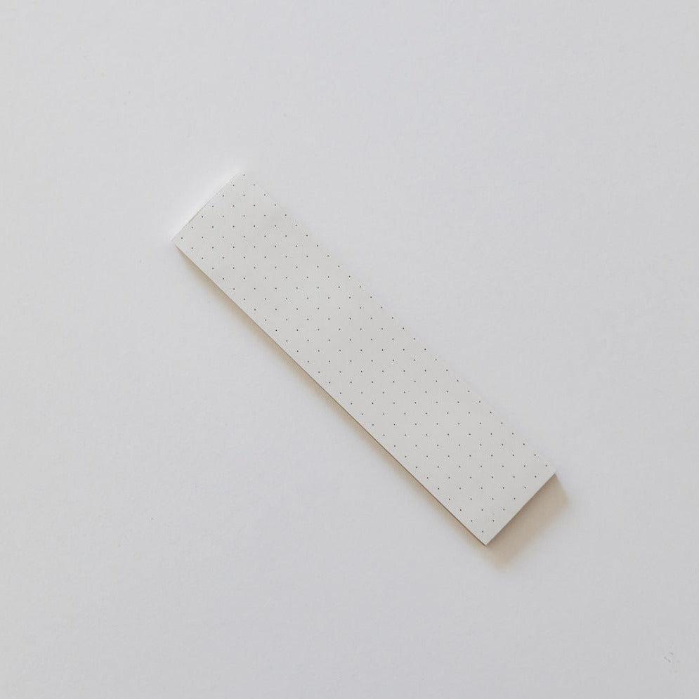 An Emma Kate Co to do list sticky notes 2 pack with dots on it on a white surface.