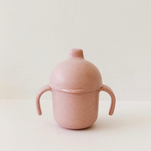 The sweetest little sippy cup made of a compostable plastic called wheat straw. An environmentally friendly design that is sturdy, strong and super cute.
