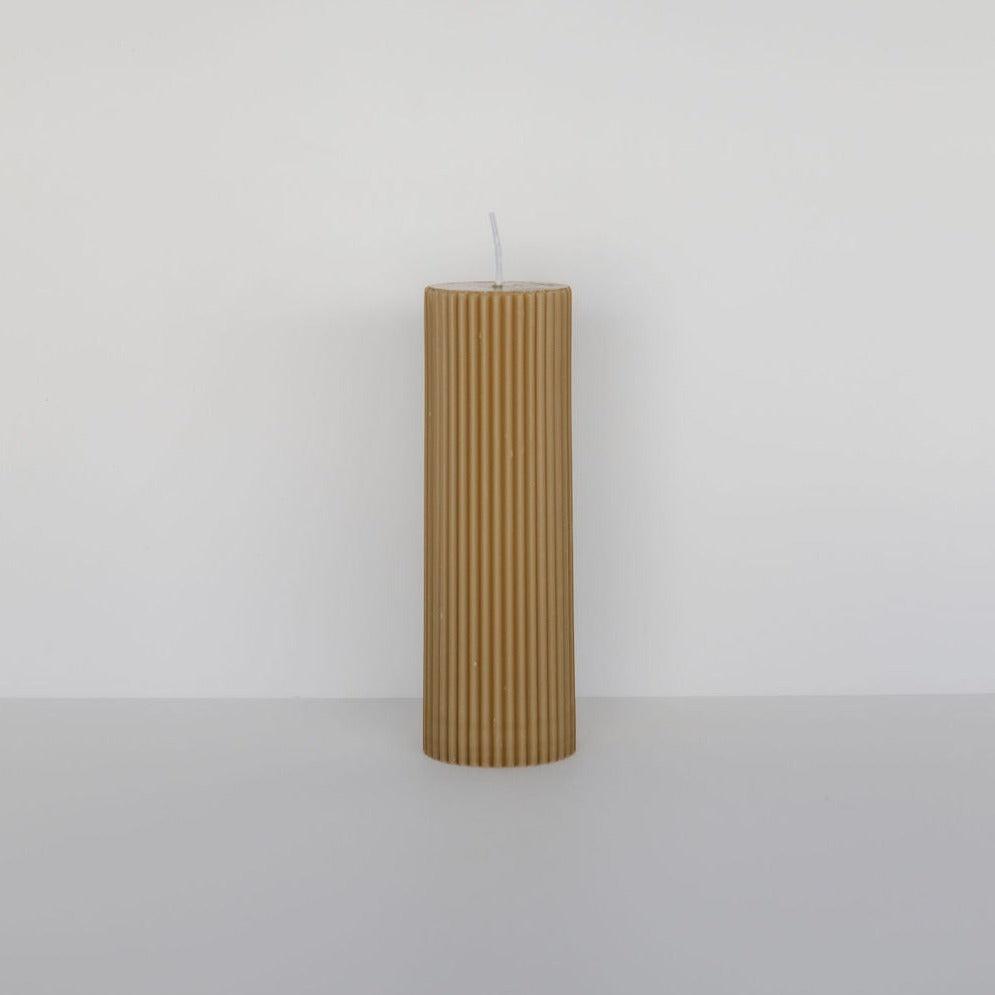 A wide column pillar candle on a white background. (Product Name: wide column pillar candle | honey, Brand Name: Black Blaze)