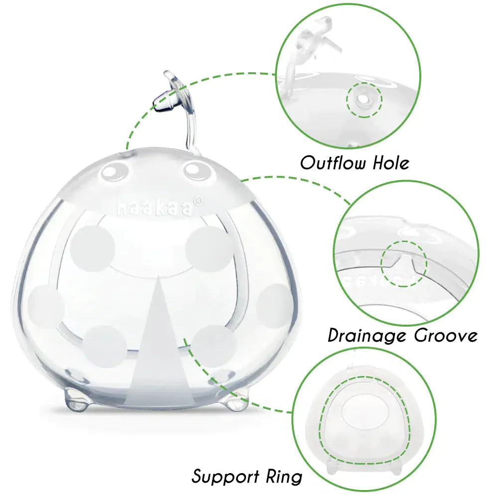 An image of a Haakaa Ladybug Silicone Breast Milk Collector with a ring on it.