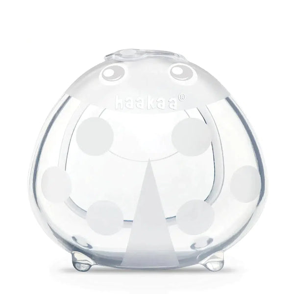A Haakaa Ladybug Silicone Breast Milk Collector on a white background.